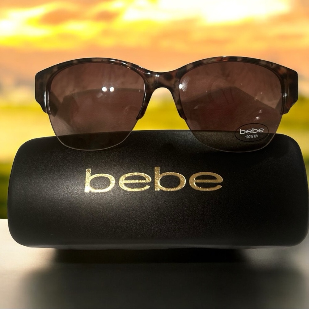 Bebe New Sunglasses & case. Only used except for display beautiful sunglasses UV